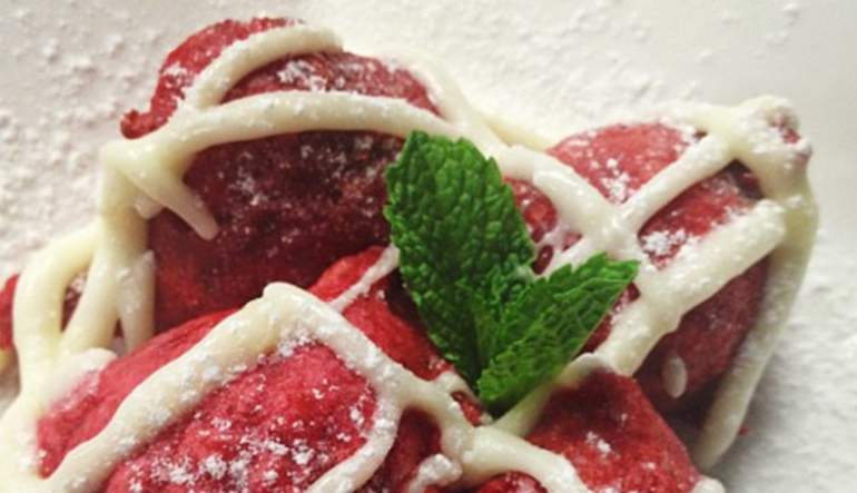 Red Velvet Beignets with Cream cheese frosting