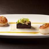 Seared Sea Scallop with Black Pudding, celery, tangerine and almond